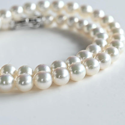 Highest grade Aurora Hanadama Tazaki Akoya pearl necklace with 7.5mm round pearls and silver clasp