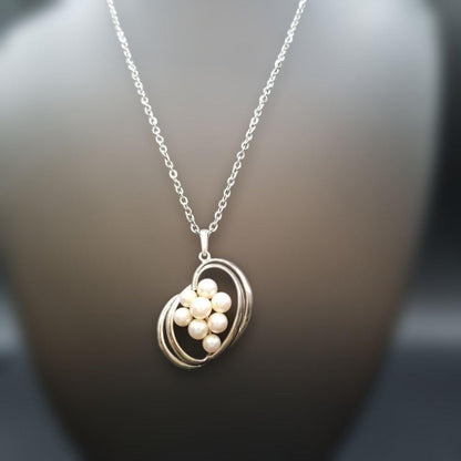 Mikimoto pearl necklace featuring grape motif pendant with 8 pearls on a silver stainless steel chain, 42 cm long