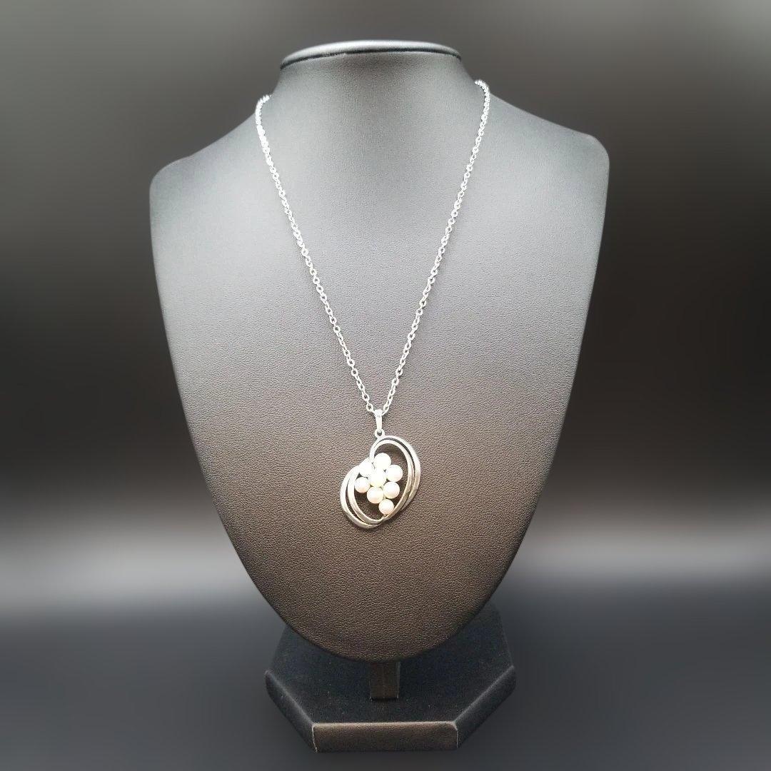 Mikimoto pearl necklace featuring grape motif pendant with 8 pearls on a silver stainless steel chain, 42 cm long
