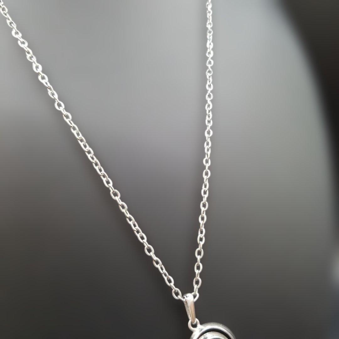 Mikimoto pearl necklace featuring grape motif pendant with 8 pearls on a silver stainless steel chain, 42 cm long