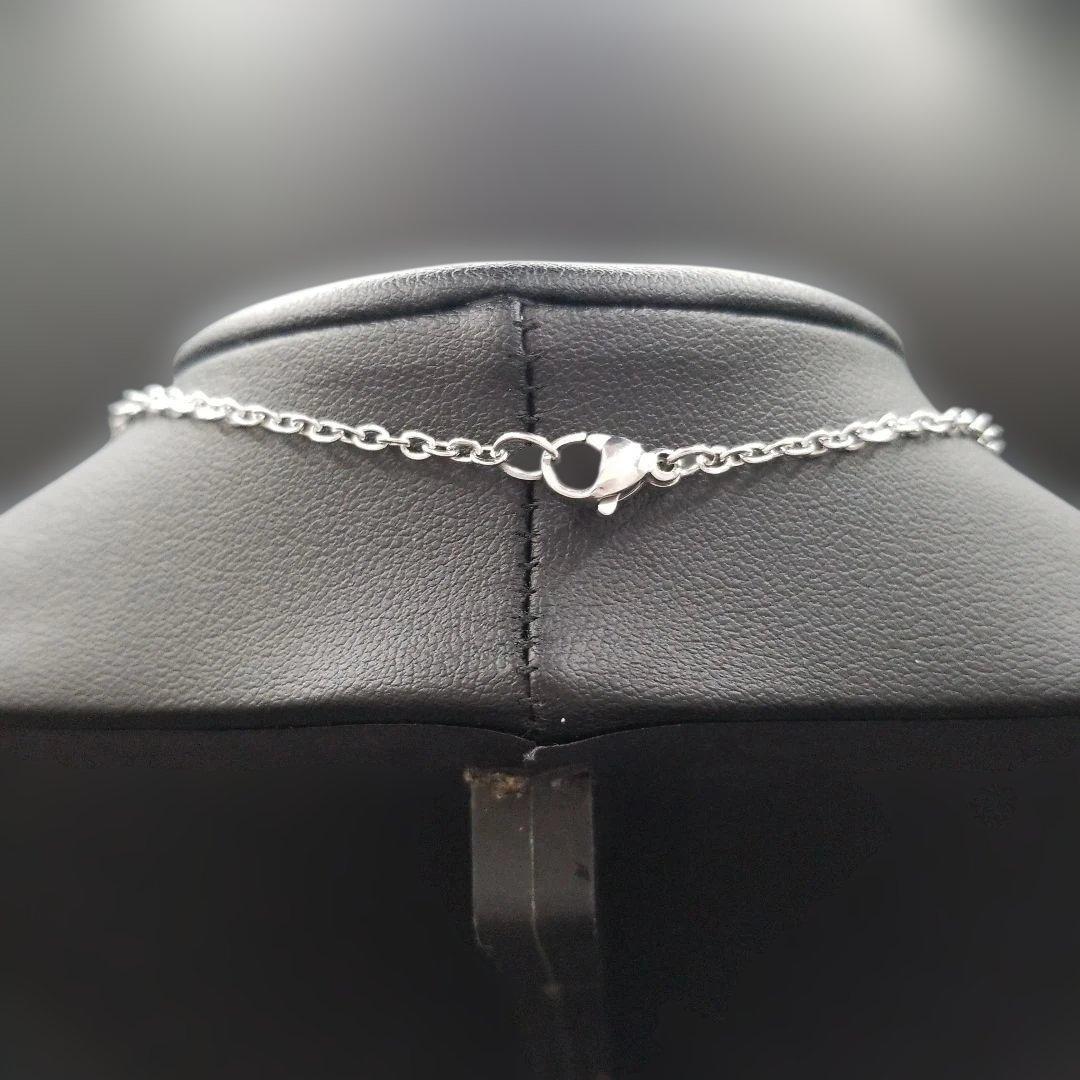 Mikimoto pearl necklace featuring grape motif pendant with 8 pearls on a silver stainless steel chain, 42 cm long