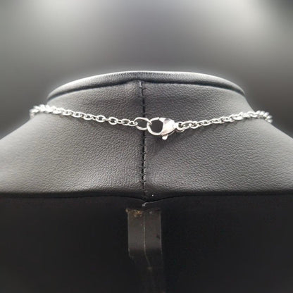 Mikimoto pearl necklace featuring grape motif pendant with 8 pearls on a silver stainless steel chain, 42 cm long