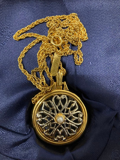 MIKIMOTO International necklace with gold filigree oval pendant and pearl on chain with dedicated case