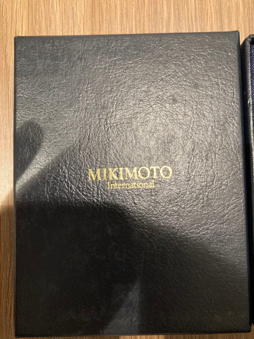 MIKIMOTO International necklace with gold filigree oval pendant and pearl on chain with dedicated case
