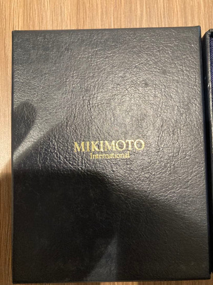 MIKIMOTO International necklace with gold filigree oval pendant and pearl on chain with dedicated case