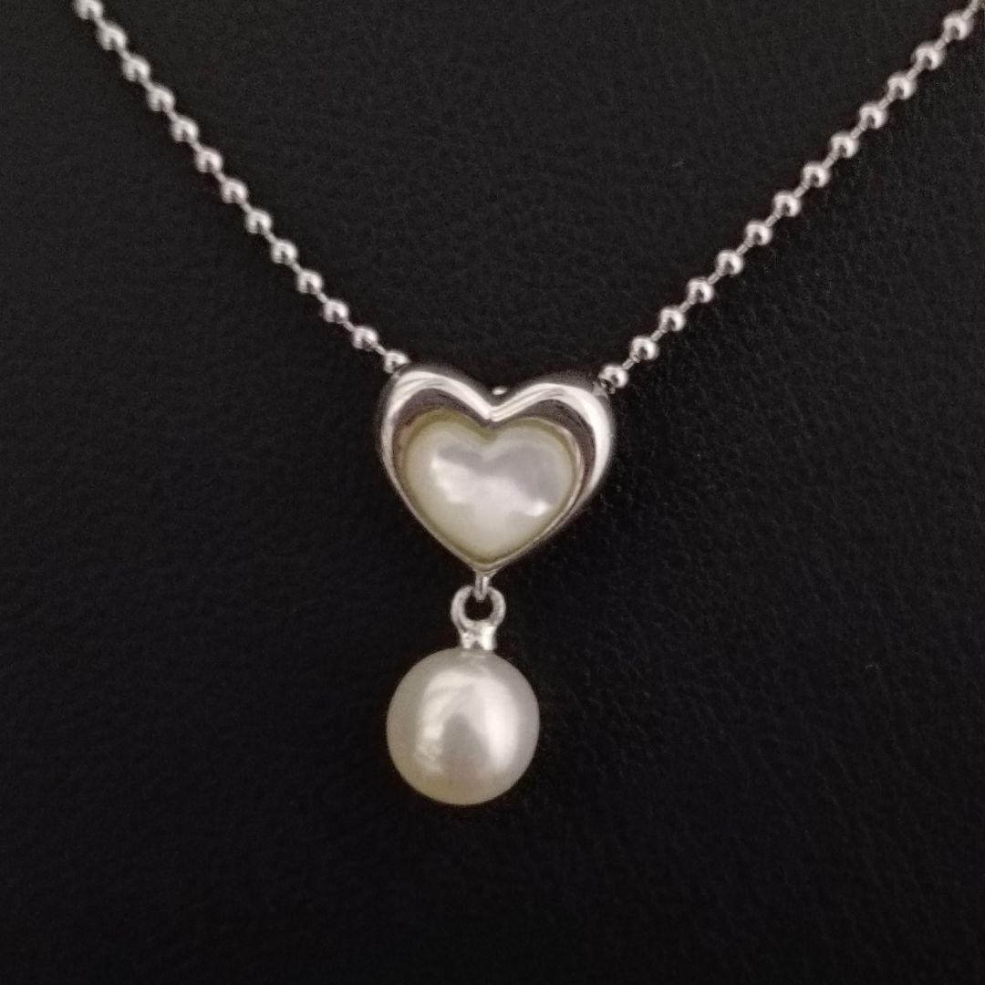 Tasaki necklace featuring a small pearl heart pendant on a 40 cm sterling silver chain