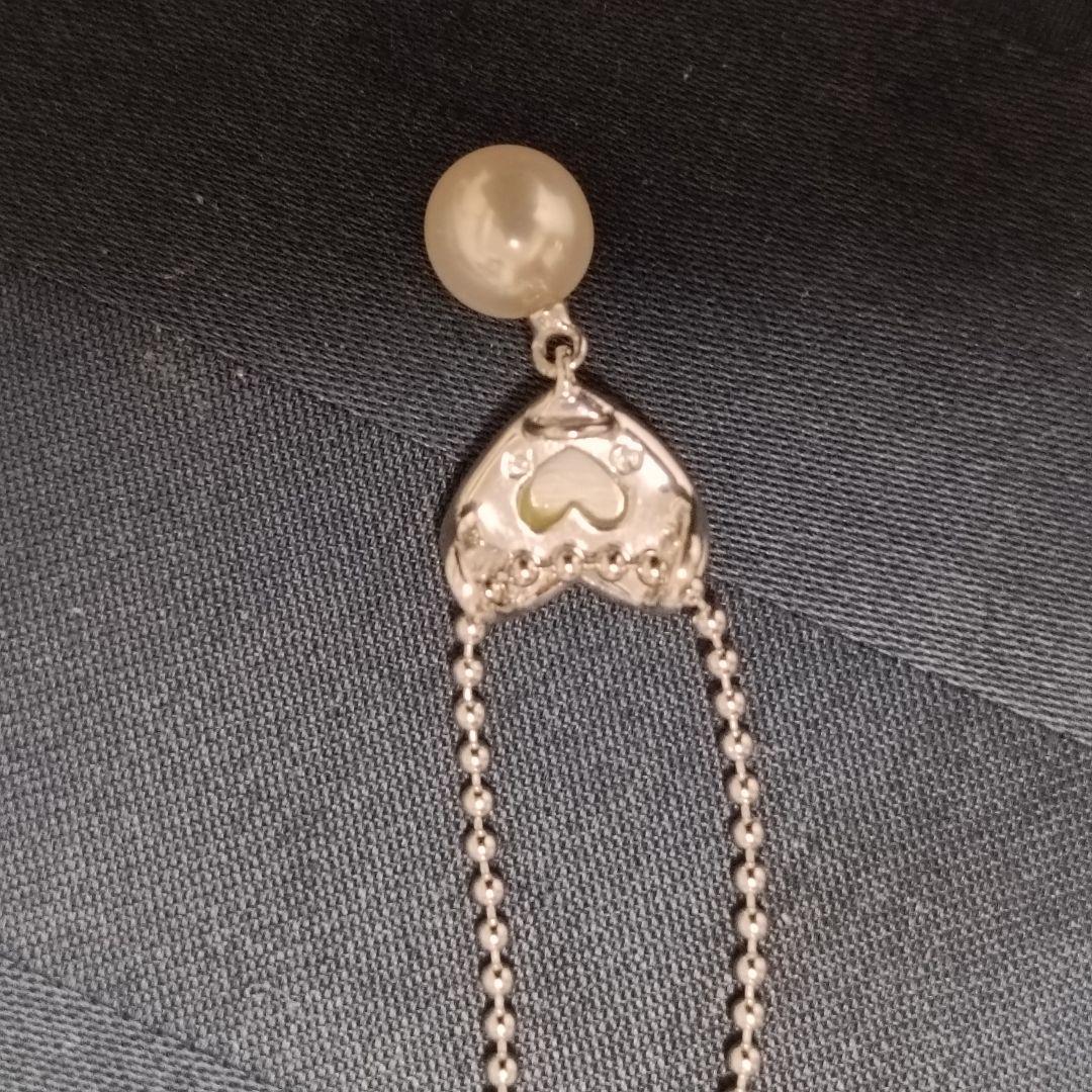 Tasaki necklace featuring a small pearl heart pendant on a 40 cm sterling silver chain