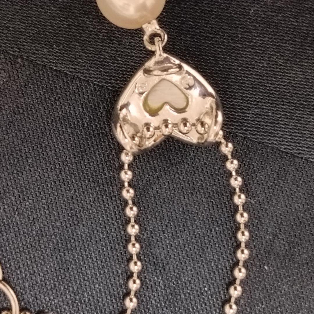 Tasaki necklace featuring a small pearl heart pendant on a 40 cm sterling silver chain