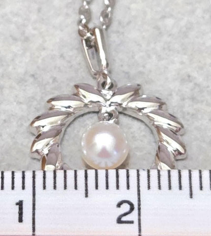 MIKIMOTO Akoya pearl silver necklace, 38 centimeters long with lustrous pearls