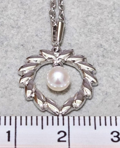 MIKIMOTO Akoya pearl silver necklace, 38 centimeters long with lustrous pearls
