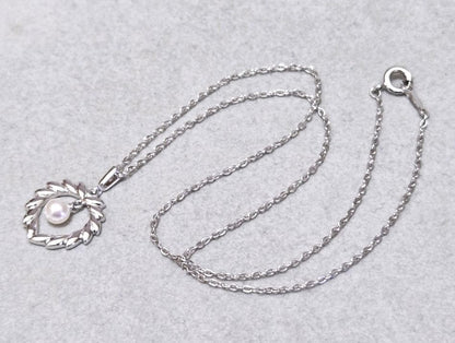 MIKIMOTO Akoya pearl silver necklace, 38 centimeters long with lustrous pearls