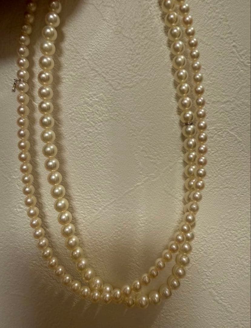 Mikimoto Akoya pearl necklace 43cm with 6.0−6.5mm pearls and silver clasp on white background
