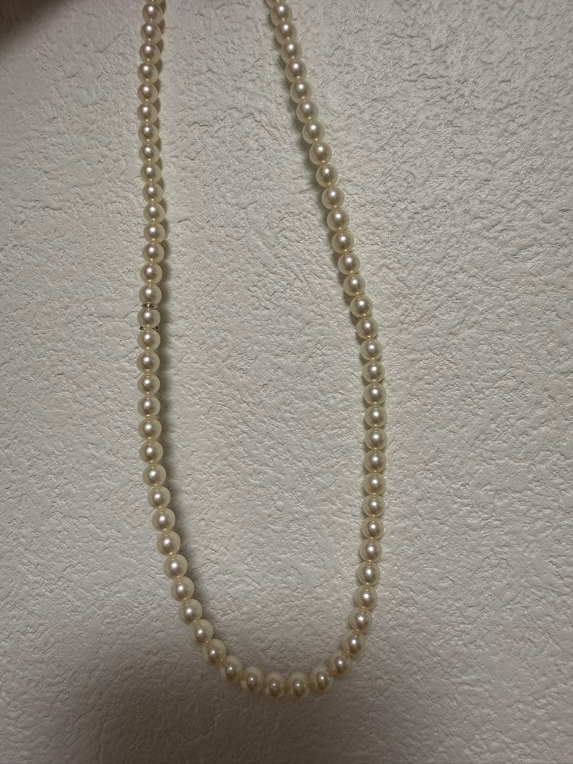 Mikimoto Akoya pearl necklace 43cm with 6.0−6.5mm pearls and silver clasp on white background
