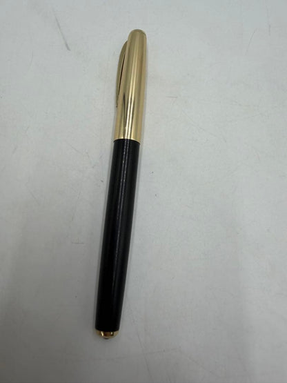 PILOT Fountain Pen with black body and 14K gold accents on a white background