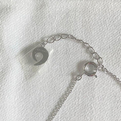 TASAKI necklace with 5mm Akoya pearl pendant in sterling silver featuring horseshoe design and chain up to 42 cm