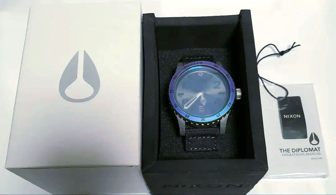 NIXON DIPLOMAT SURPLUS/ANTIQUE SILVER Quartz Men's Watch — Japanese
