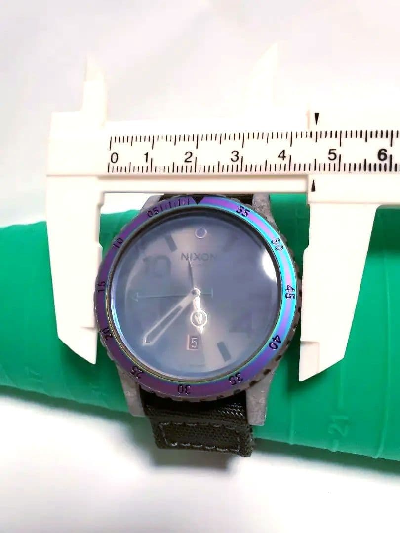 NIXON DIPLOMAT SURPLUS/ANTIQUE SILVER Quartz Men's Watch — Japanese