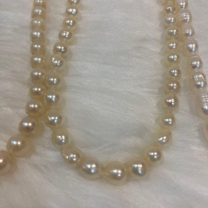 Akoya and Freshwater Pearl Necklace set with silver clasps totaling 83 grams