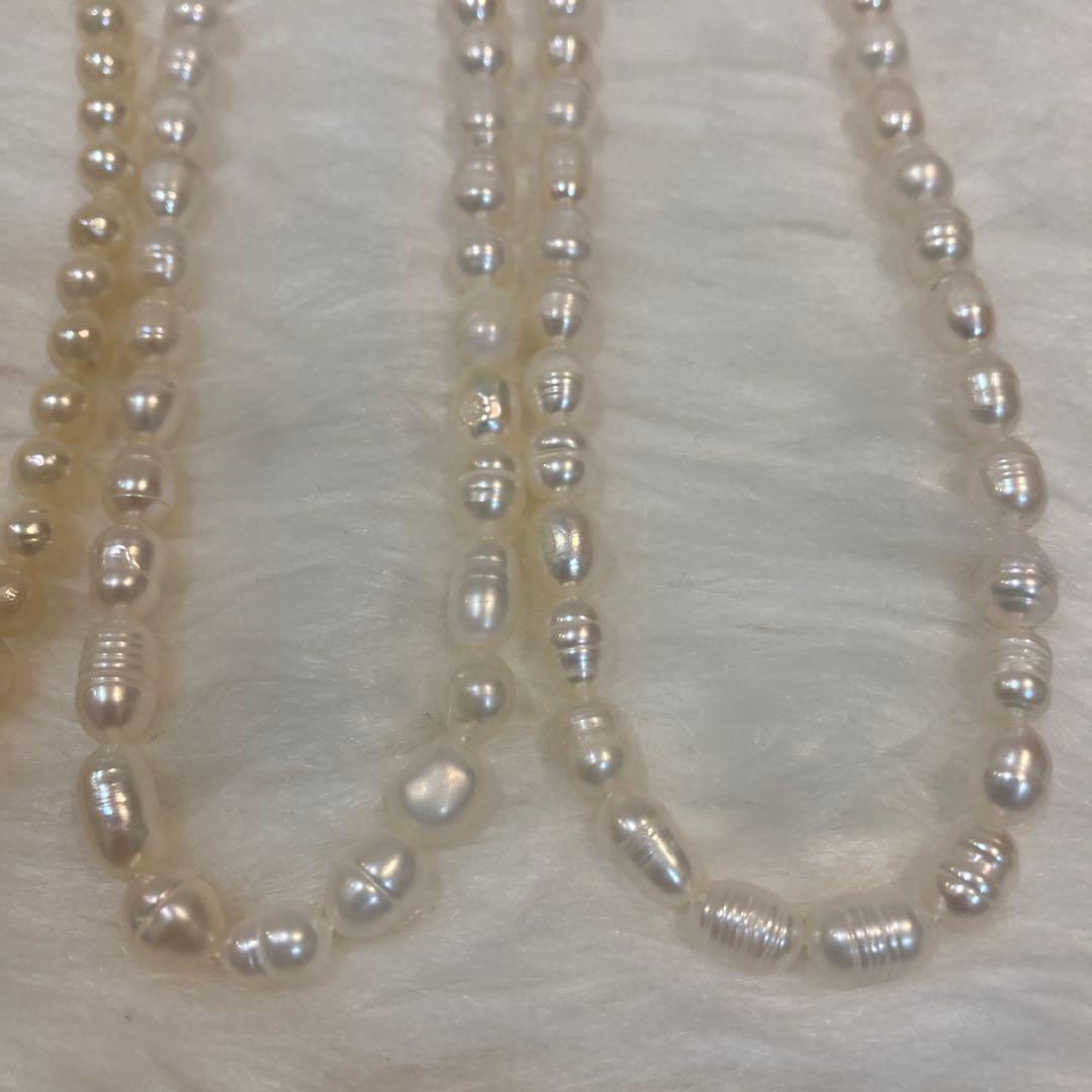 Akoya and Freshwater Pearl Necklace set with silver clasps totaling 83 grams