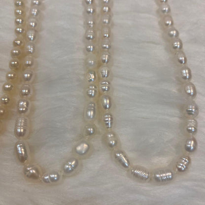 Akoya and Freshwater Pearl Necklace set with silver clasps totaling 83 grams