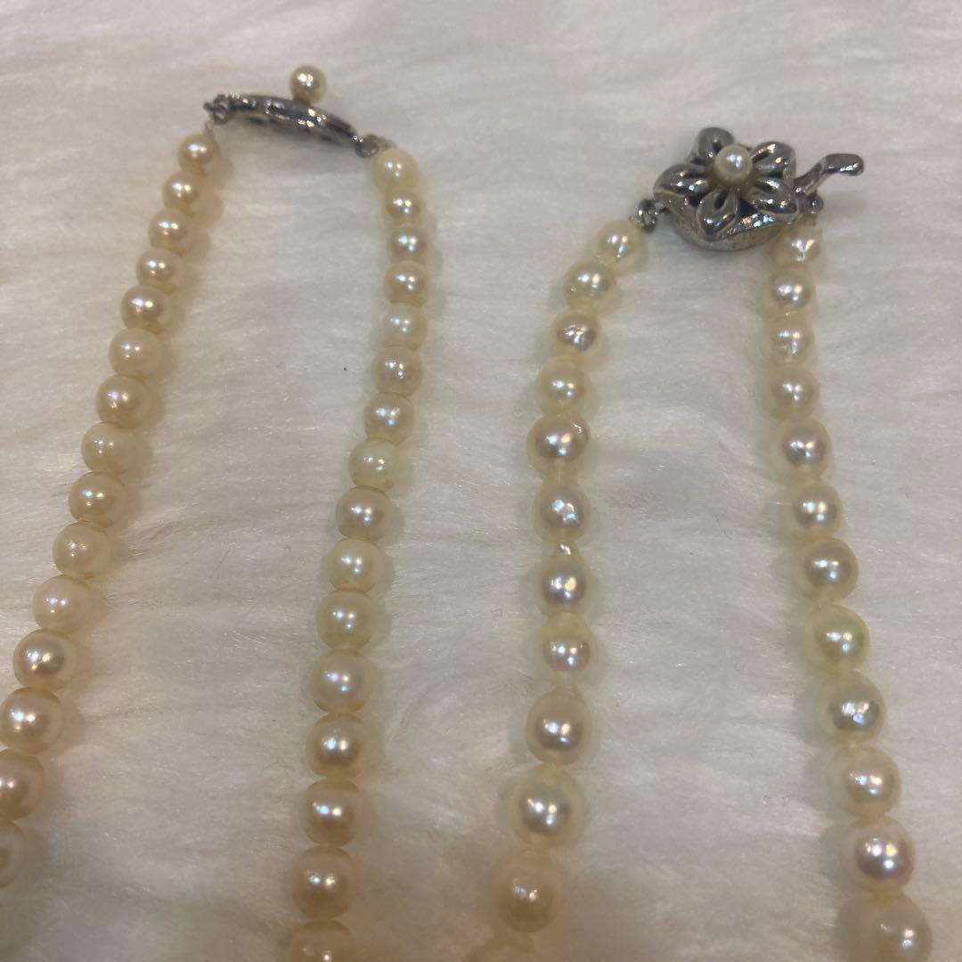 Akoya and Freshwater Pearl Necklace set with silver clasps totaling 83 grams