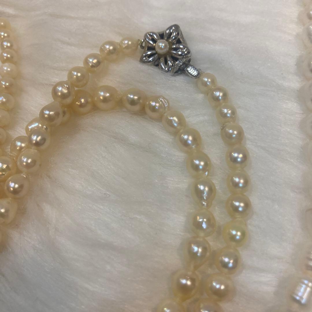 Akoya and Freshwater Pearl Necklace set with silver clasps totaling 83 grams