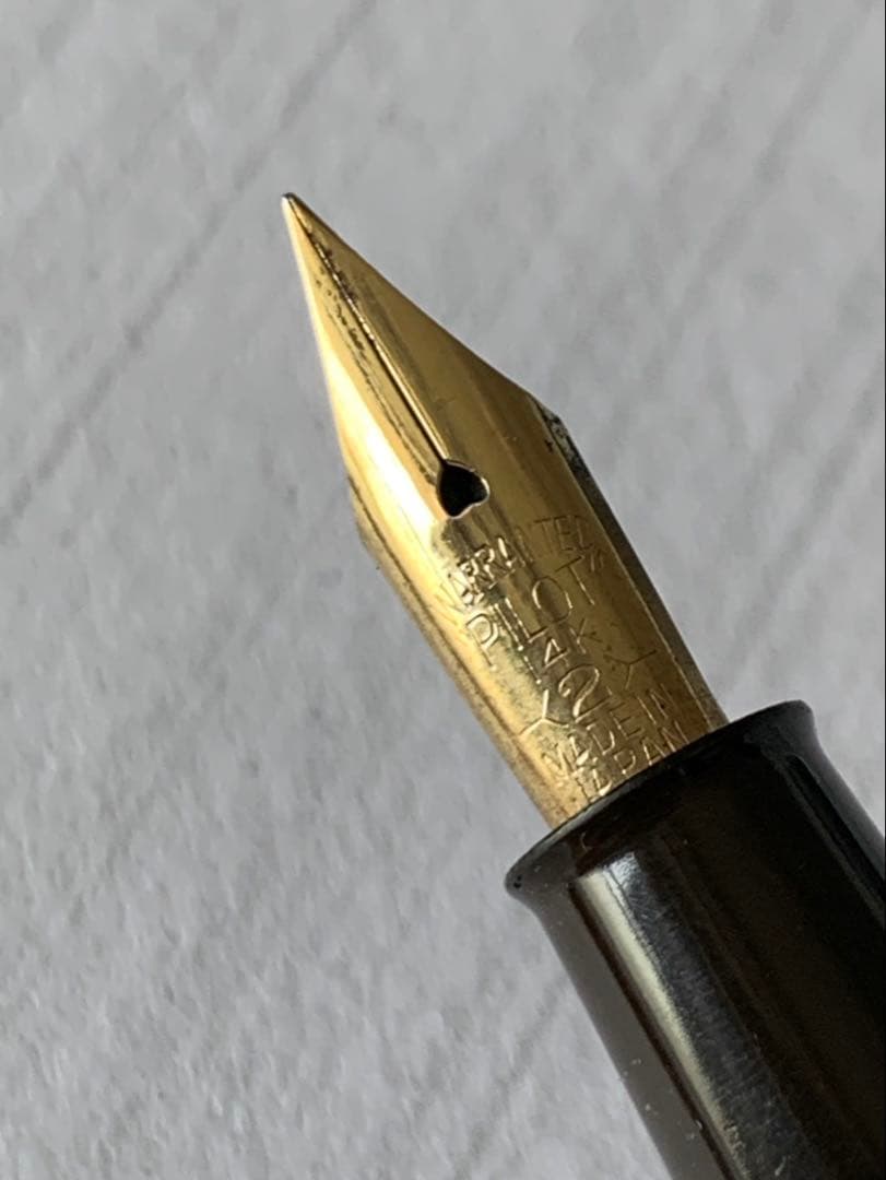Pilot Fountain Pen featuring a 14K gold nib with a sleek black barrel