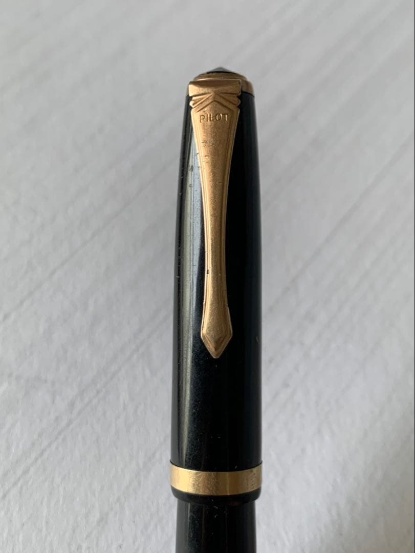 Pilot Fountain Pen featuring a 14K gold nib with a sleek black barrel