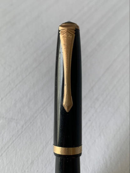 Pilot Fountain Pen featuring a 14K gold nib with a sleek black barrel