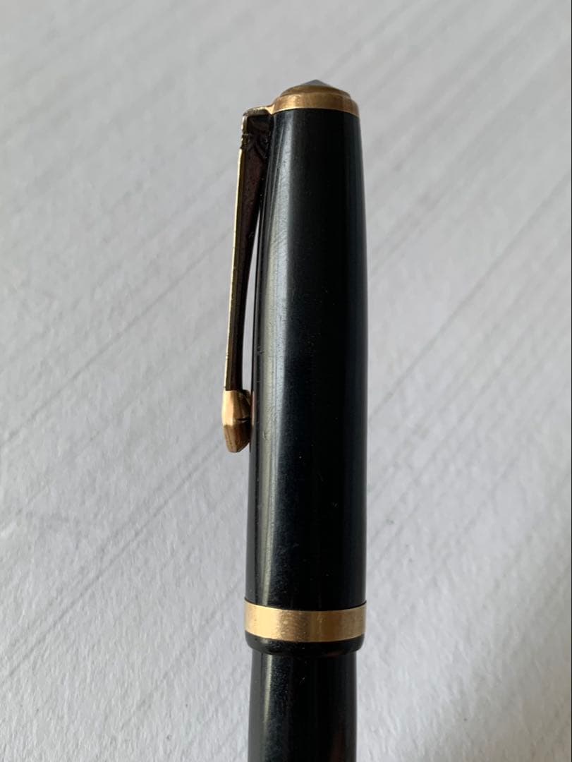 Pilot Fountain Pen featuring a 14K gold nib with a sleek black barrel