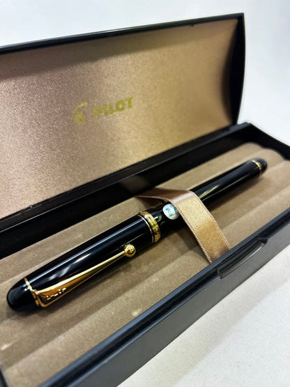 PILOT Black Fountain Pen with 14K gold decoration shown with black resin body and included case