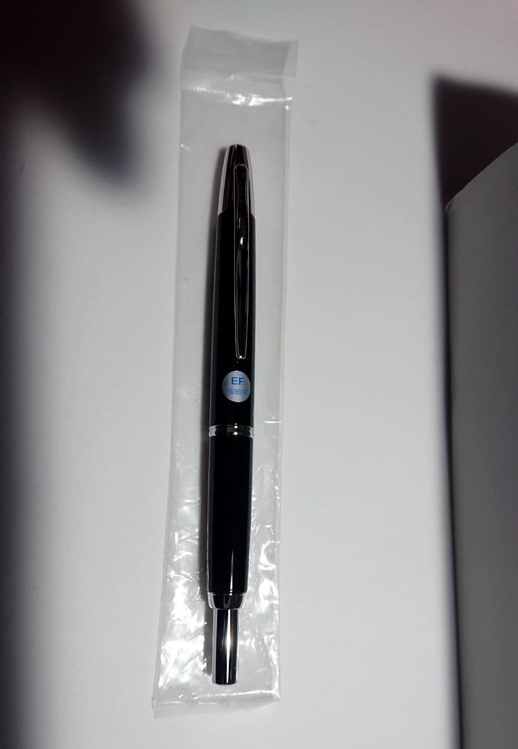 PILOT Capless Black fountain pen with extra fine nib shown with case and instruction manual