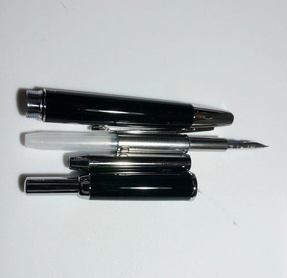 PILOT Capless Black fountain pen with extra fine nib shown with case and instruction manual