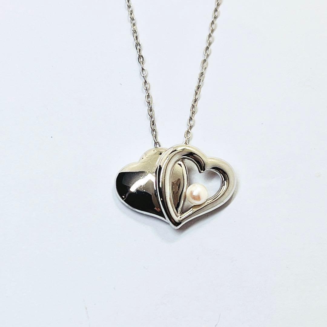 Mikimoto baby pearl necklace with 4.0 mm pearls and silver double heart pendant on a 40 cm chain