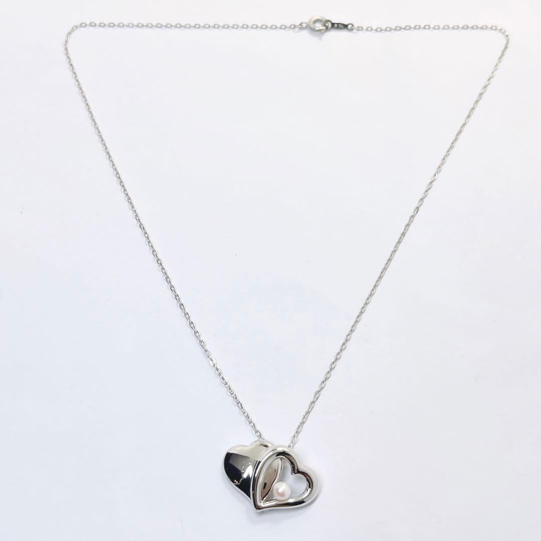 Mikimoto baby pearl necklace with 4.0 mm pearls and silver double heart pendant on a 40 cm chain
