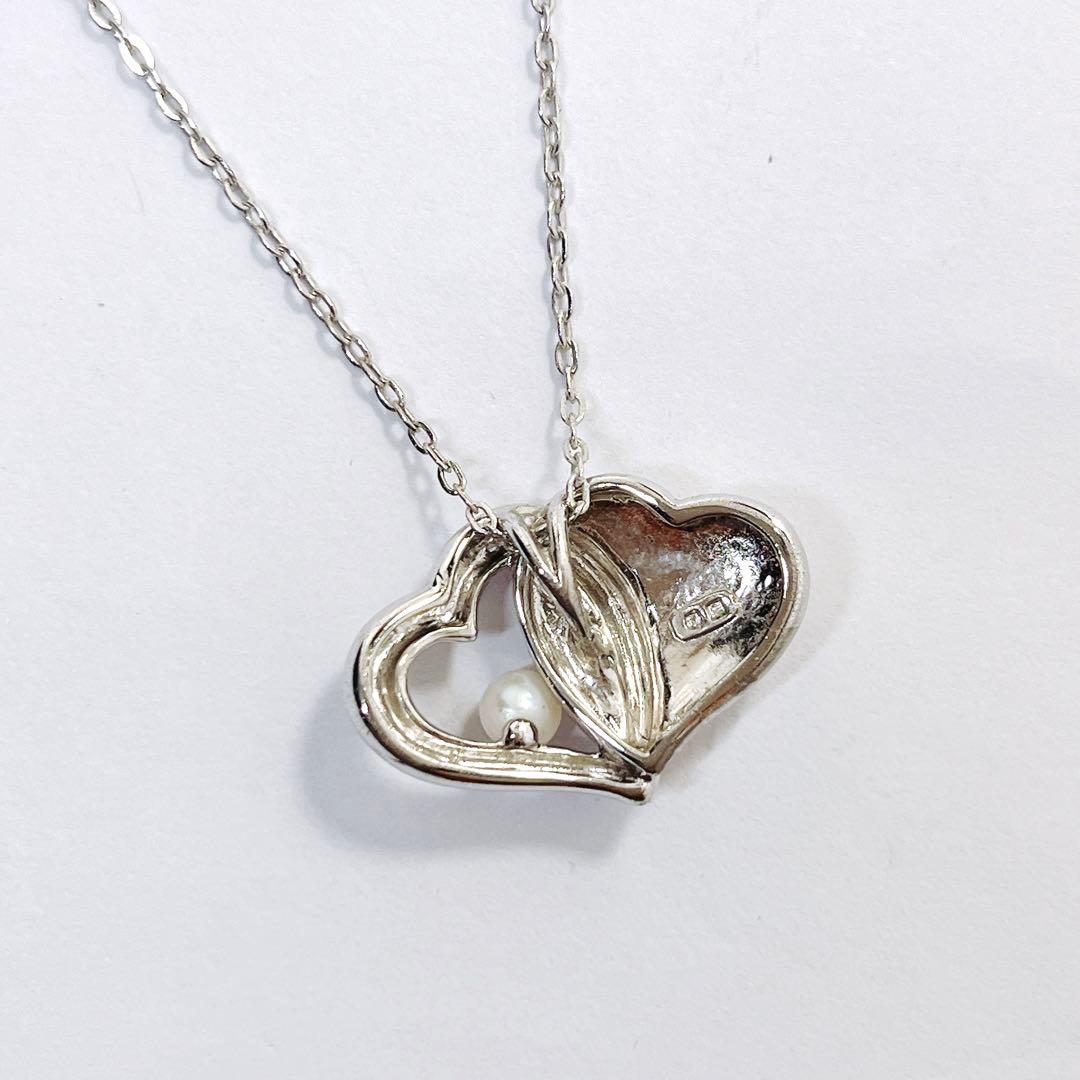 Mikimoto baby pearl necklace with 4.0 mm pearls and silver double heart pendant on a 40 cm chain