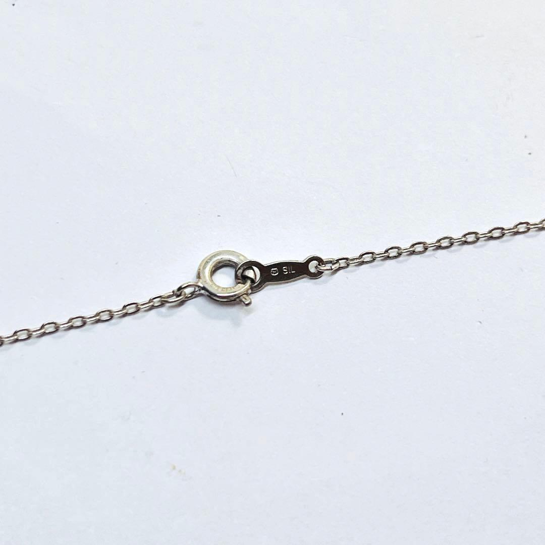 Mikimoto baby pearl necklace with 4.0 mm pearls and silver double heart pendant on a 40 cm chain