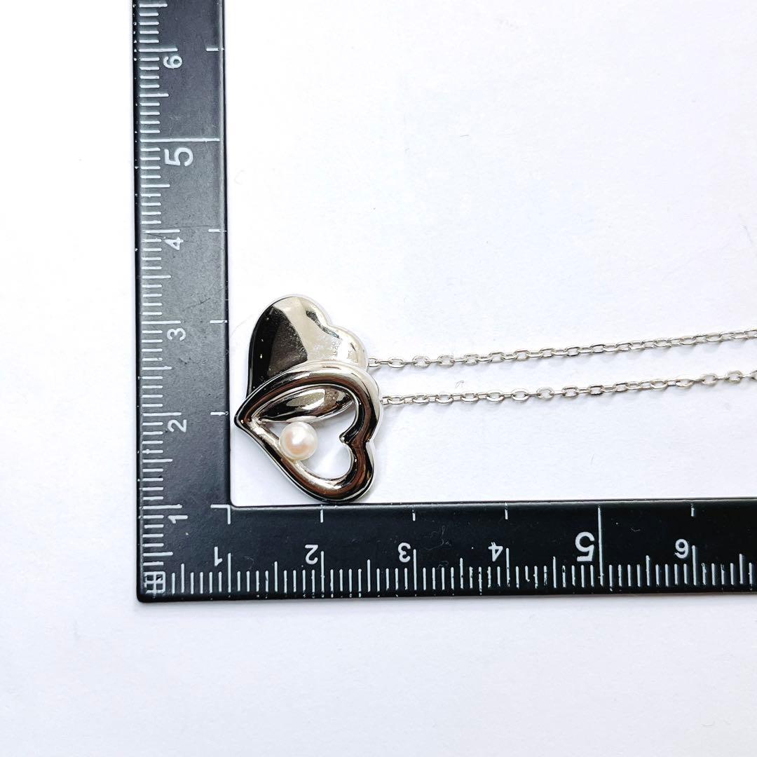 Mikimoto baby pearl necklace with 4.0 mm pearls and silver double heart pendant on a 40 cm chain