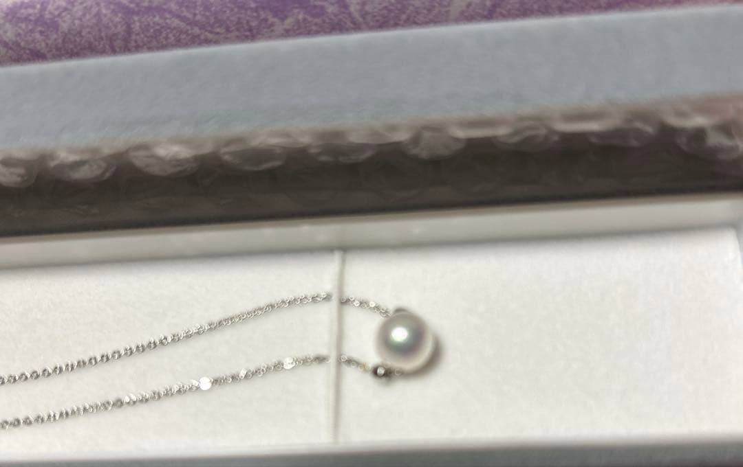 Imperial Palace Akoya pearl pendant in silver tone with natural pearl shapes and no damage or discoloration