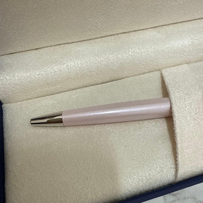 Waterman pink metal ballpoint pen with dedicated case on white background