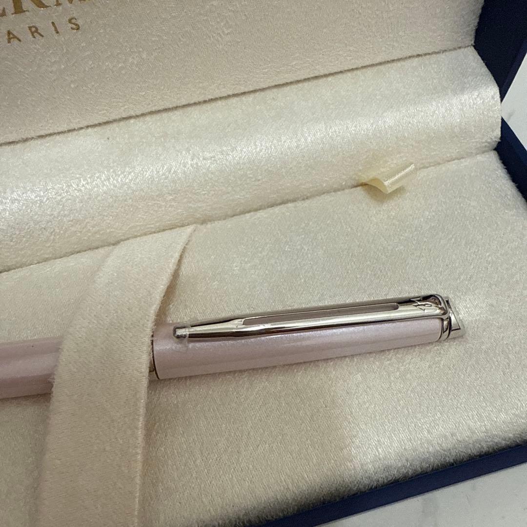 Waterman pink metal ballpoint pen with dedicated case on white background