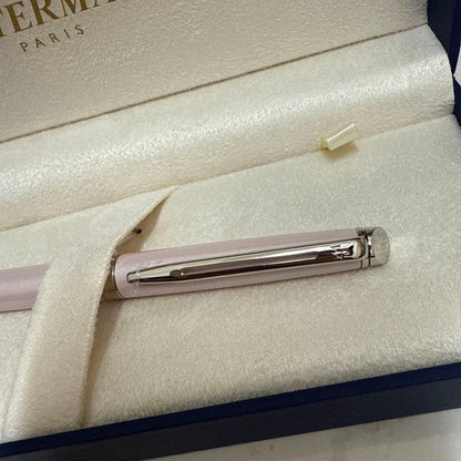 Waterman pink metal ballpoint pen with dedicated case on white background