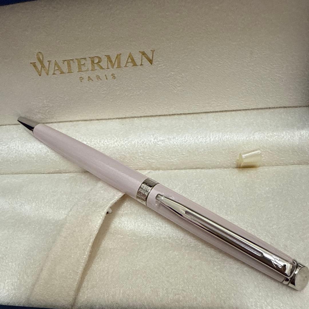 Waterman pink metal ballpoint pen with dedicated case on white background