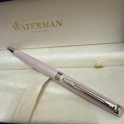 Waterman pink metal ballpoint pen with dedicated case on white background