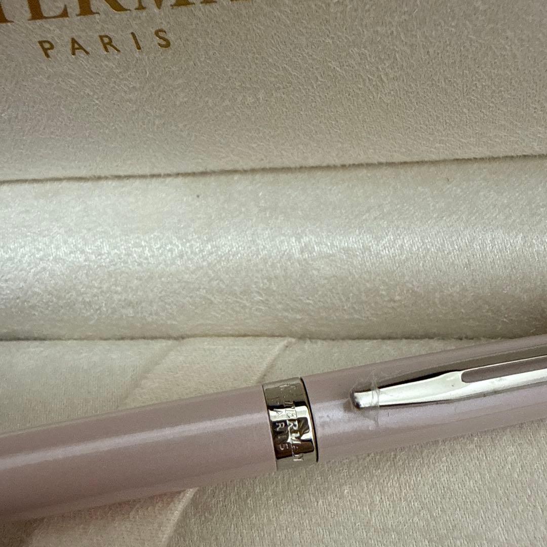 Waterman pink metal ballpoint pen with dedicated case on white background