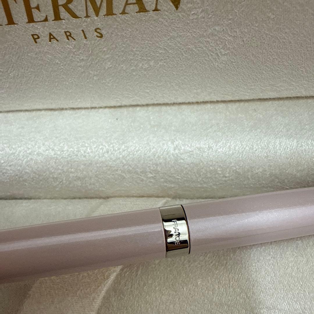 Waterman pink metal ballpoint pen with dedicated case on white background