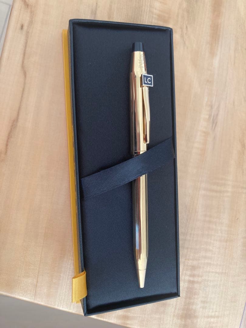 Gold CROSS ballpoint pen with gold logo and classic design from 1864