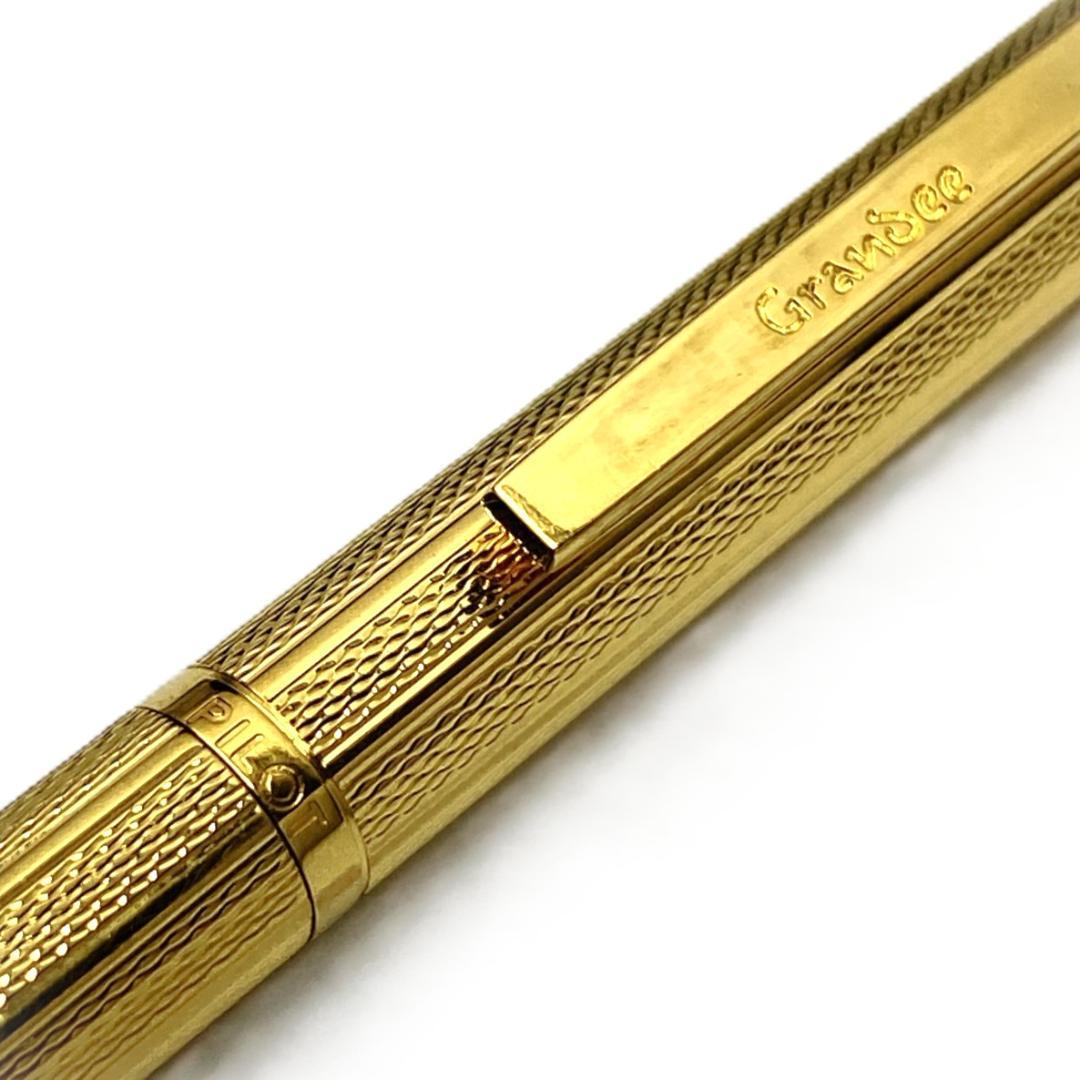 PILOT Grandee 22KGP gold ballpoint pen with black body and twist mechanism, includes refill, no visible damage