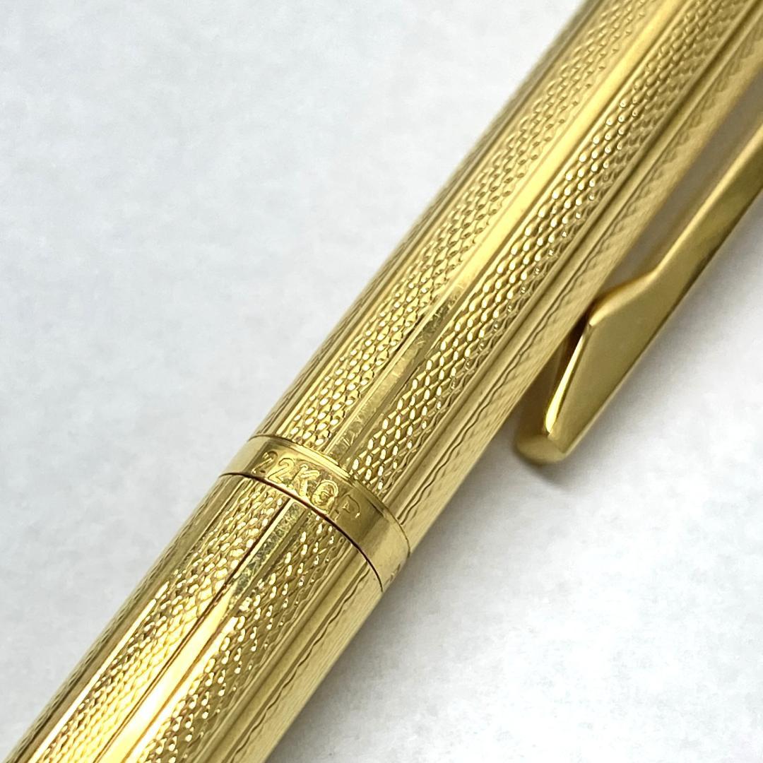 PILOT Grandee 22KGP gold ballpoint pen with black body and twist mechanism, includes refill, no visible damage