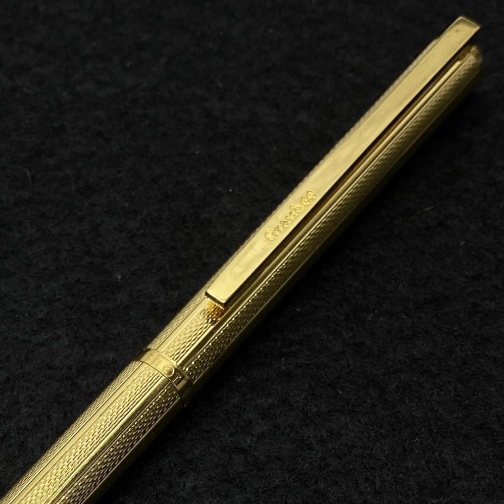 PILOT Grandee 22KGP gold ballpoint pen with black body and twist mechanism, includes refill, no visible damage